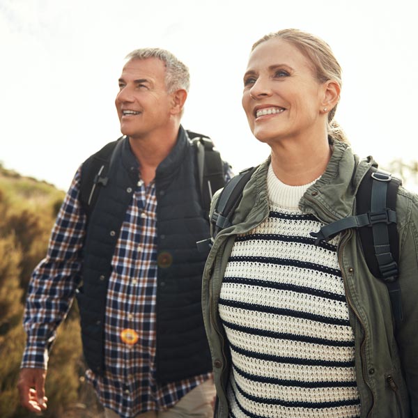 middle aged couple on hike